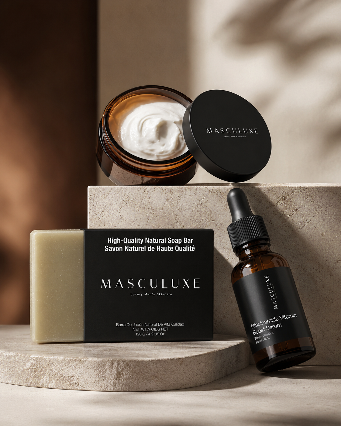 Masculuxe skincare and grooming products including a jar, soap bar, and serum on a neutral background.